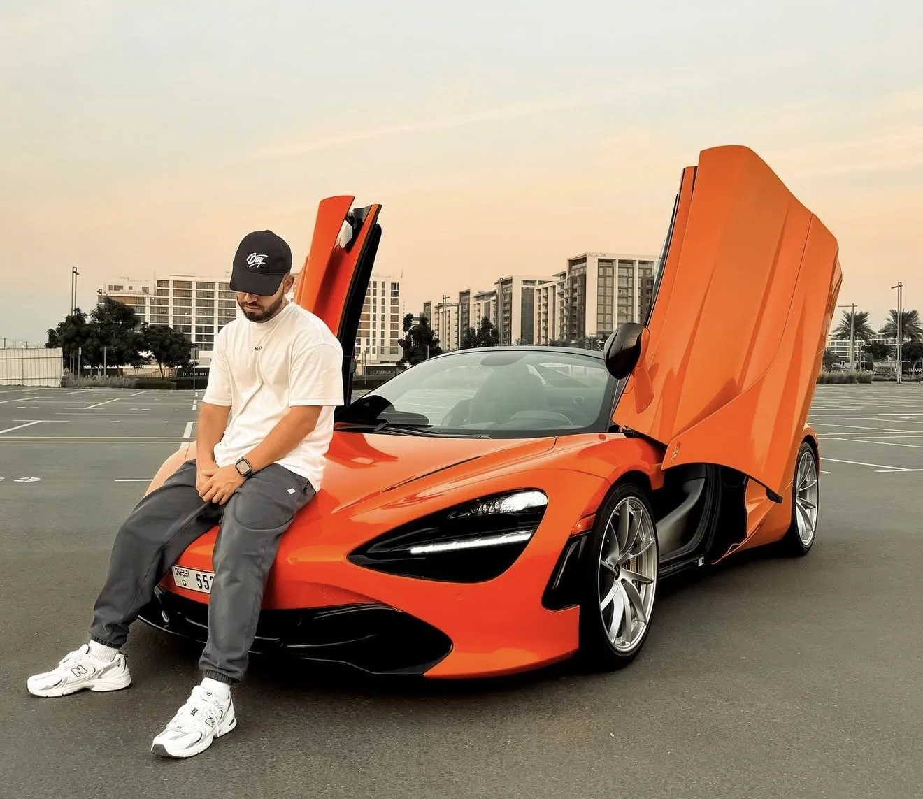 Creator with a McLaren 720S at golden hour