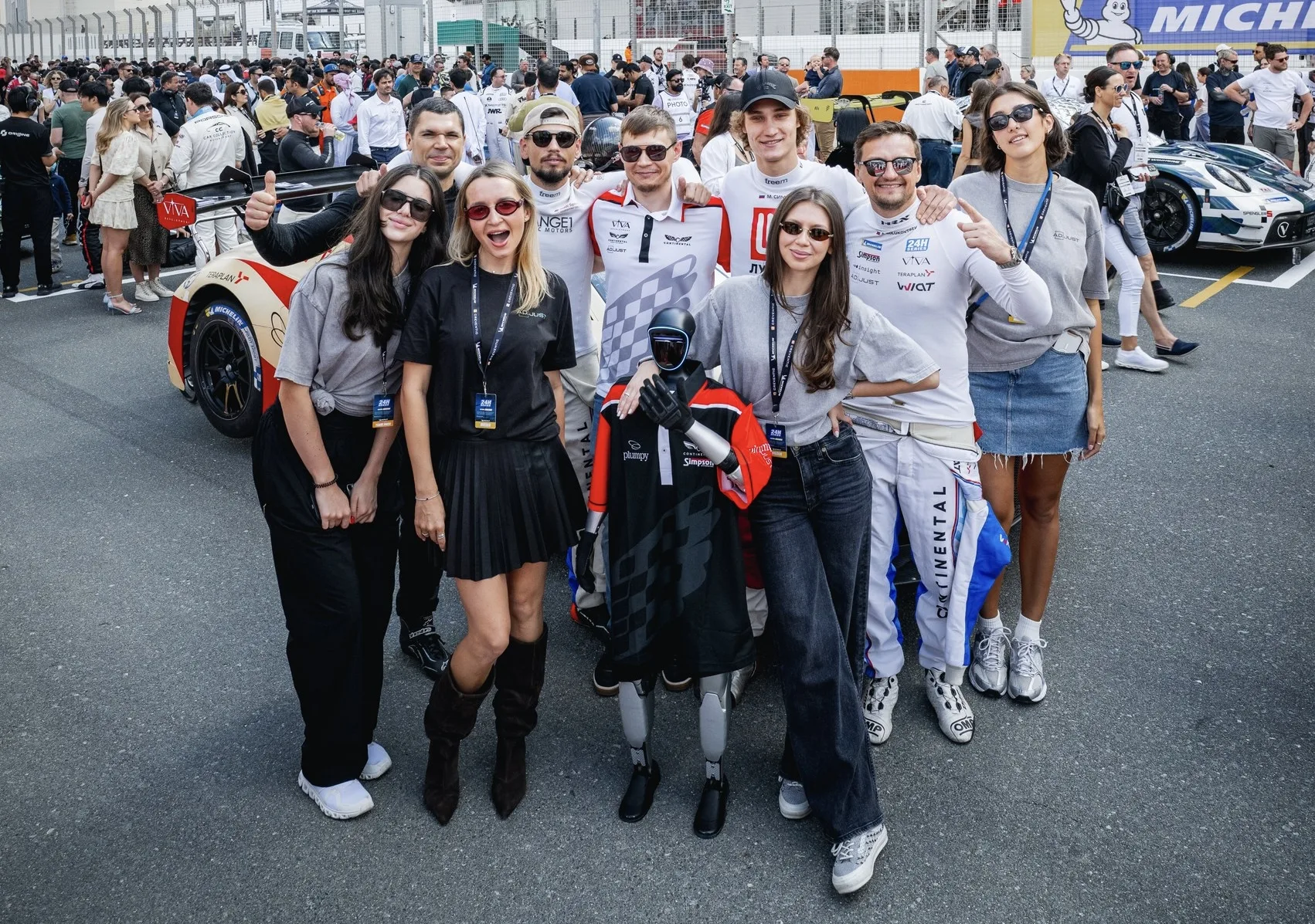 The humanoid robot standing on the starting grid at the Dubai 24H